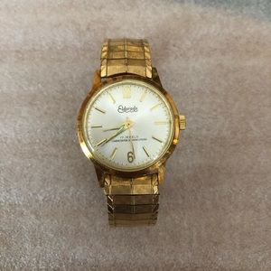 Men’s gold and silver watch